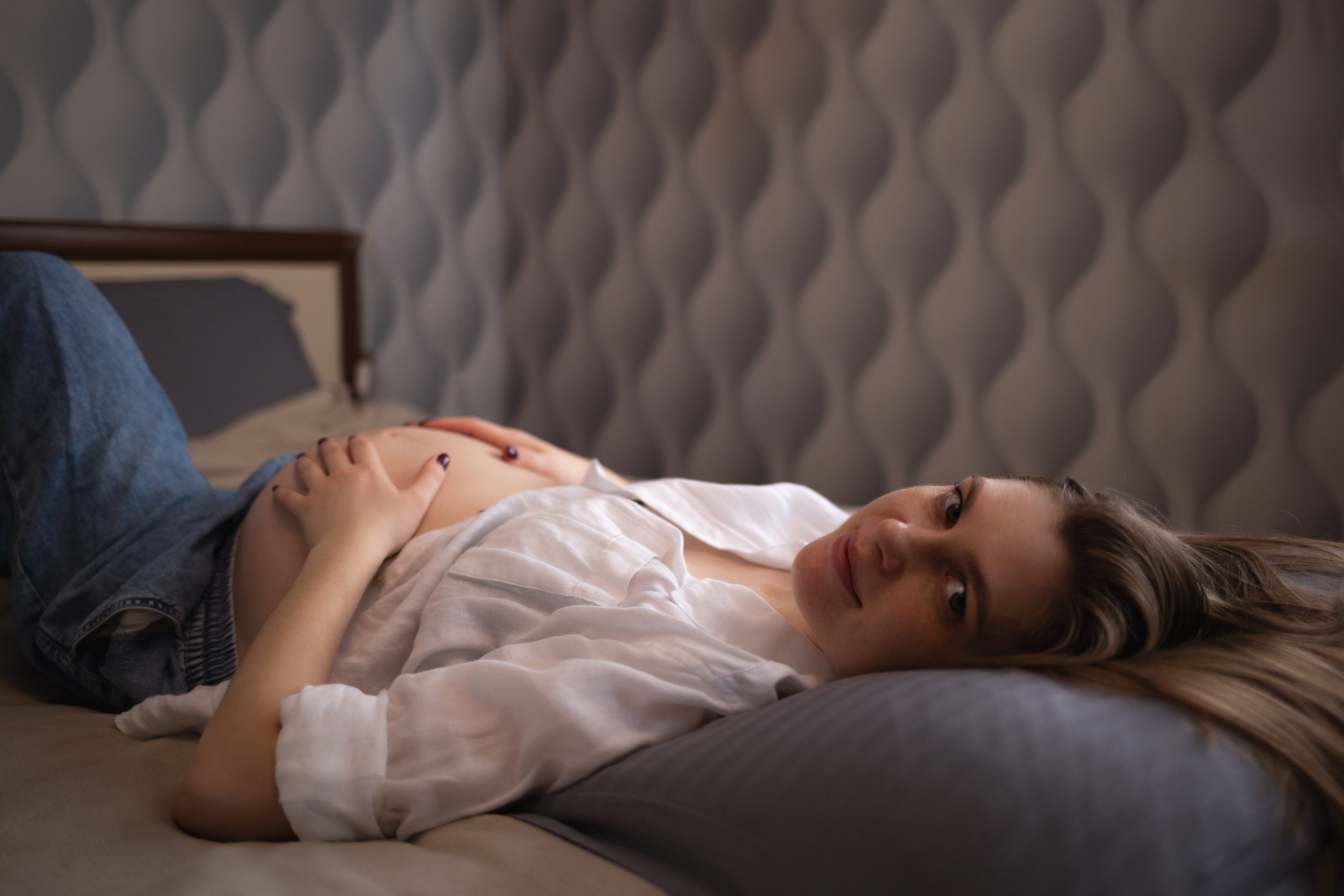 Pregnant woman feeling thoughtful