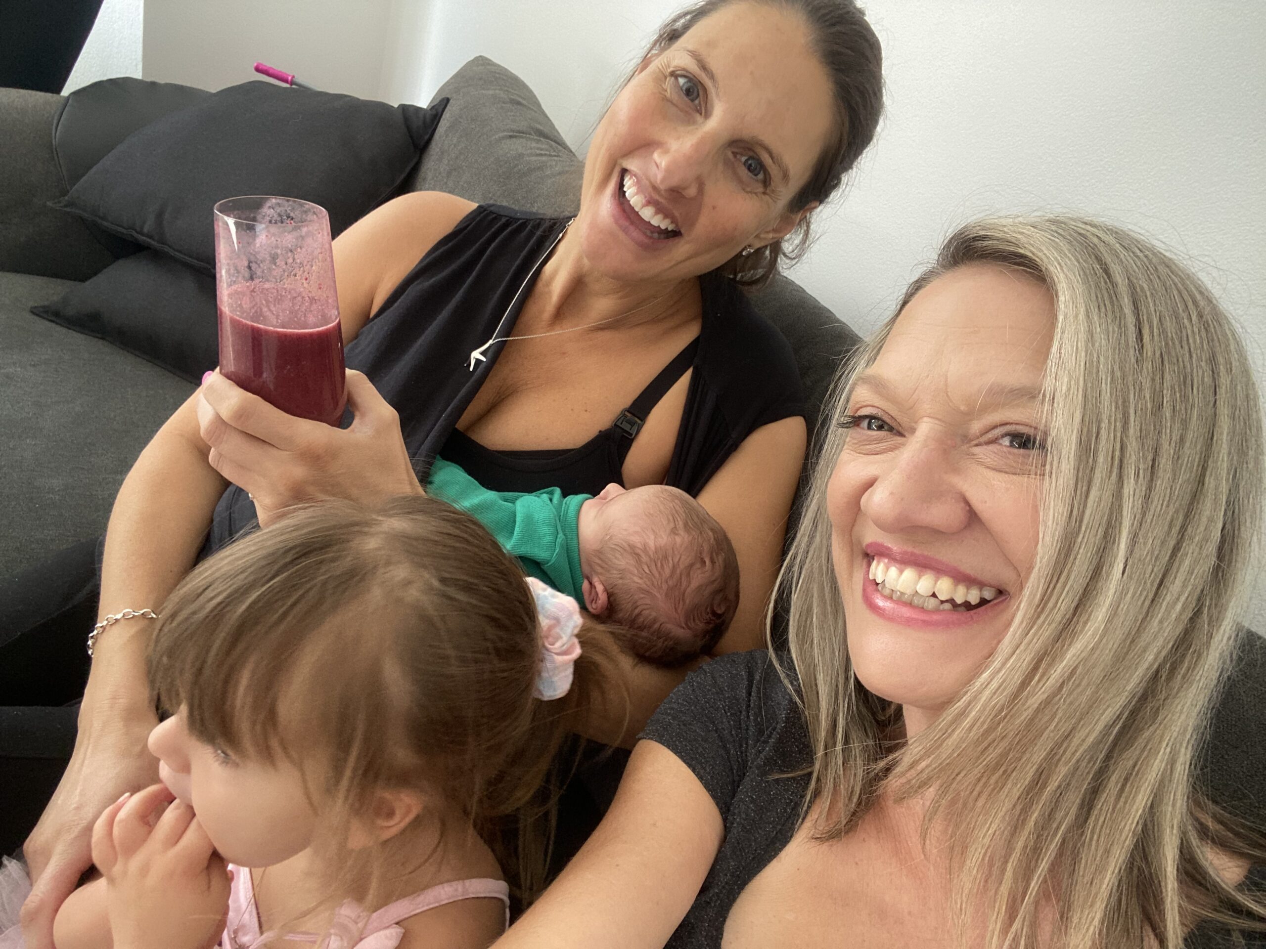 Georgie with Julia and her newborn — postpartum visit